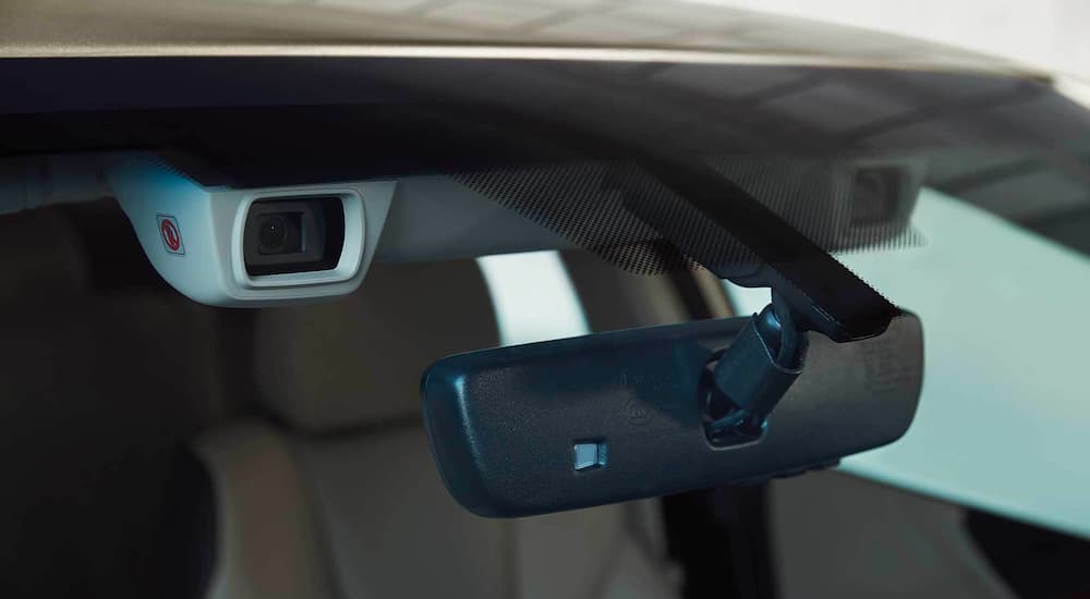 Close up of the EyeSight driver assist camera in a 2021 Subaru Legacy.