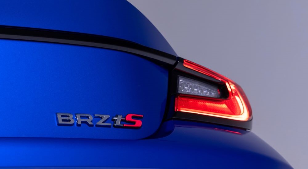 A close up of the trunk badge on a blue 2024 Subaru BRZ tS.