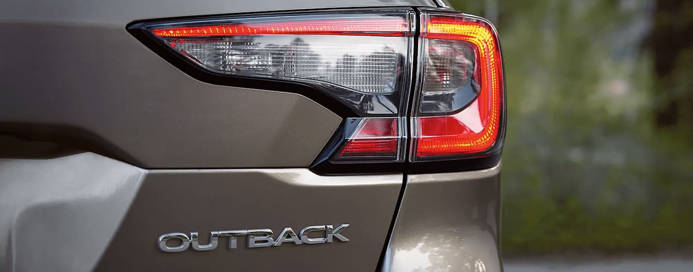 Close-up of the rear brake light on a brown 2023 Subaru Outback.