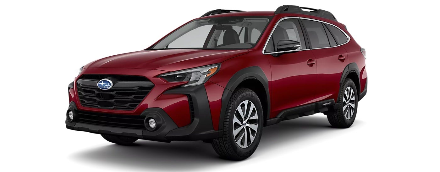 A red 2023 Subaru Outback Premium on a white background.